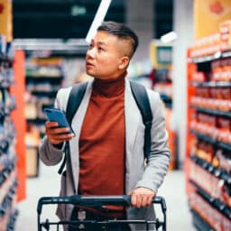 Man shopping in a supermarket