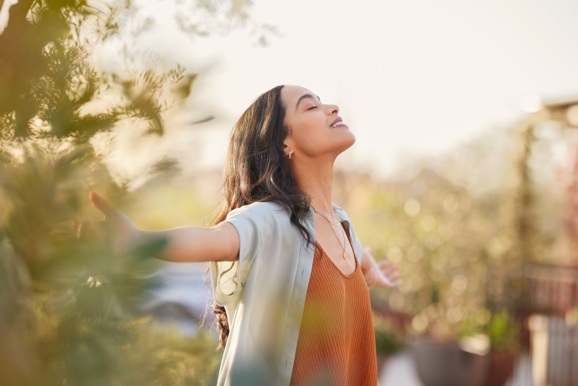 woman walking as she breathes through her nose